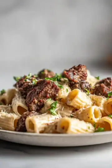 Delicious pasta dish featuring tender beef chunks and creamy sauce. Perfect comfort food for any pasta lover.